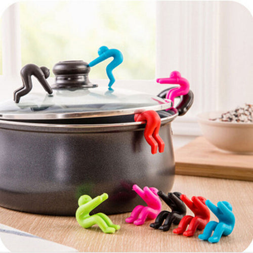 1pc creativa del hombre de anti desbordamiento estante del pote de teléfono Soporte Universial Home Kit de cocina Titular de cocina de silicona herramienta multifuncional